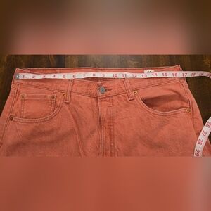 Levis 501 Button Fly In Coral / Salmon.